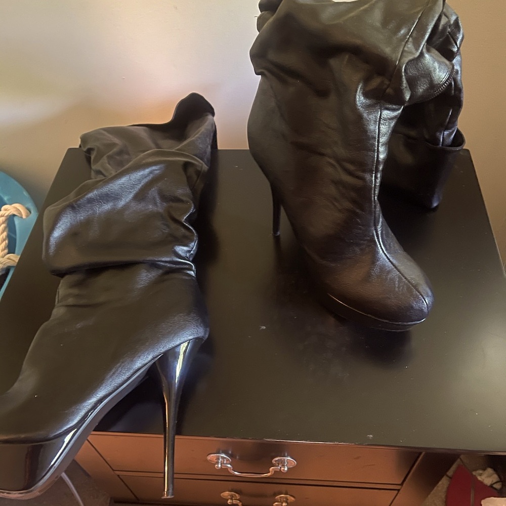 Knee high boot with heels